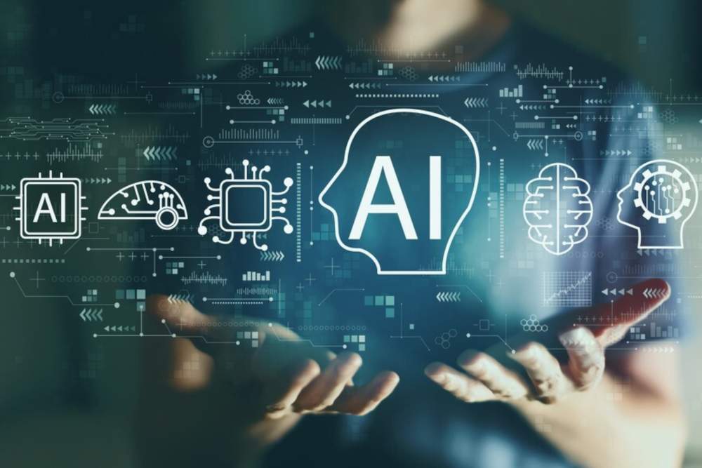 cloud looking circuits with an outline of a human head with the letters AI. Background is an unidentified person