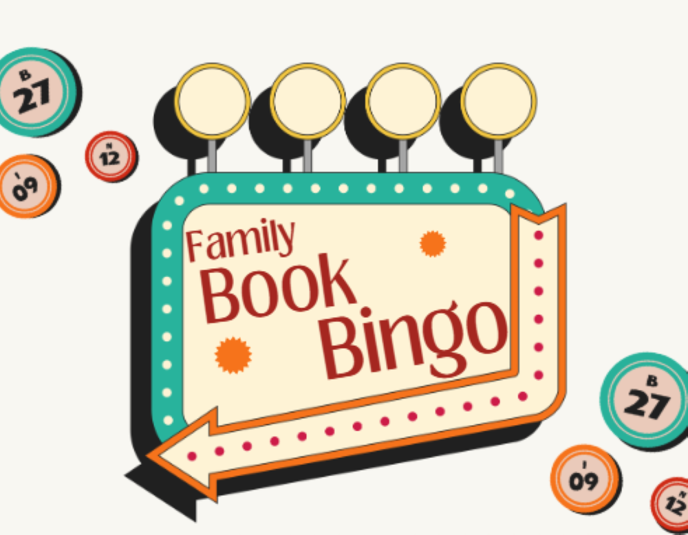 sign that says Family Book Bingo with some bingo balls